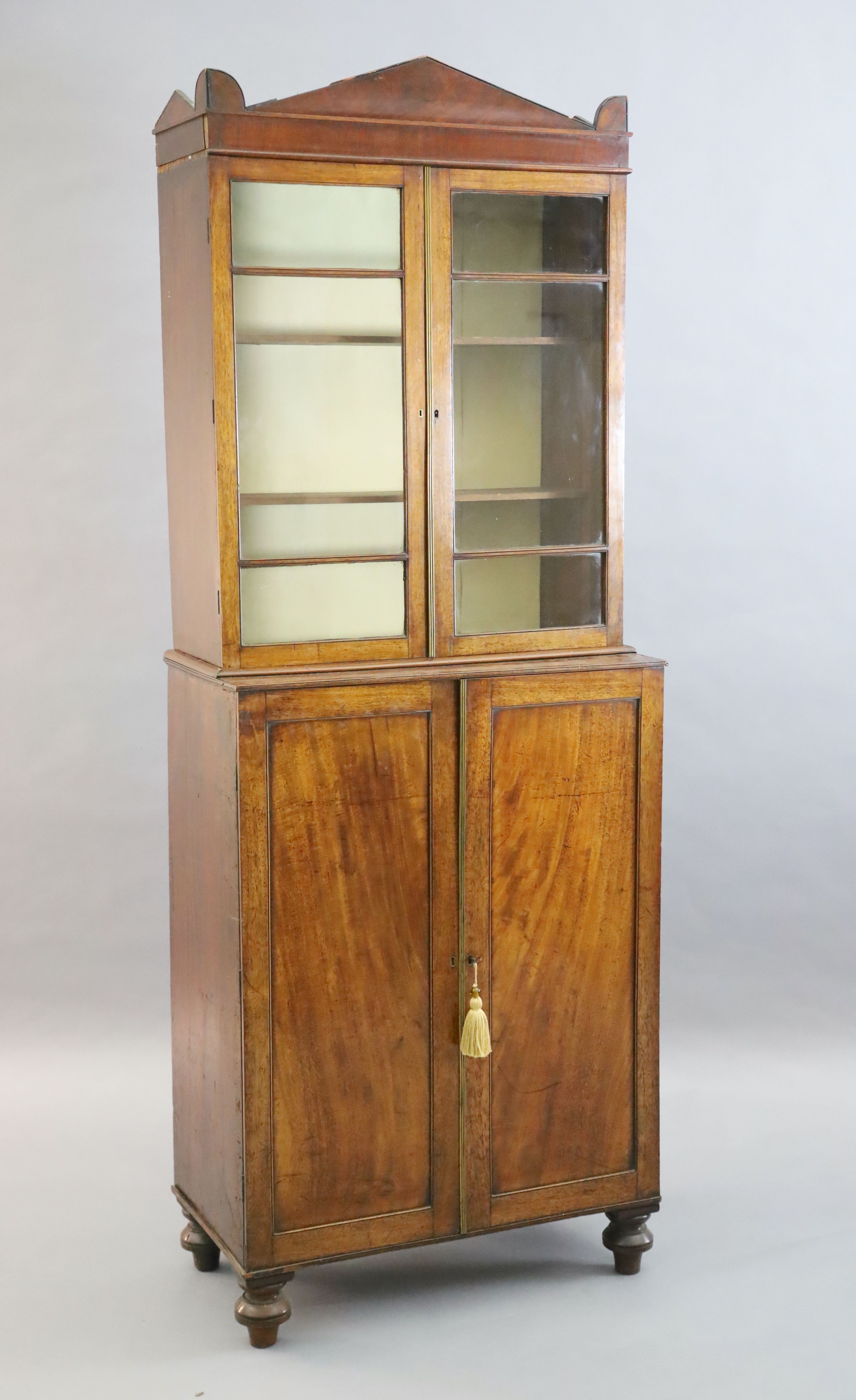 A Regency mahogany collectors cabinet, W.2ft 6in. D.1ft 4in. H.6ft 7in.